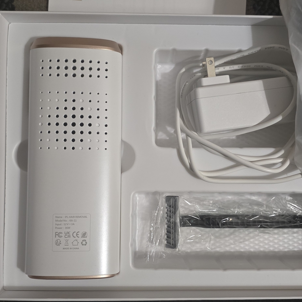 White and Gold Hair Removal Device